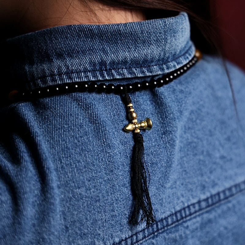 Buddha Stones tibetanas 108 cuentas de Mala ónix negro cuentas de ojo de tigre pulsera de protección Bagua de nueve palacios