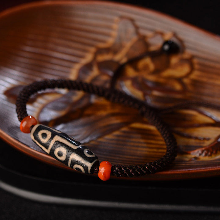 Pulsera de hilo de prosperidad con cuentas Dzi tibetanas de nueve ojos con Buddha Stones