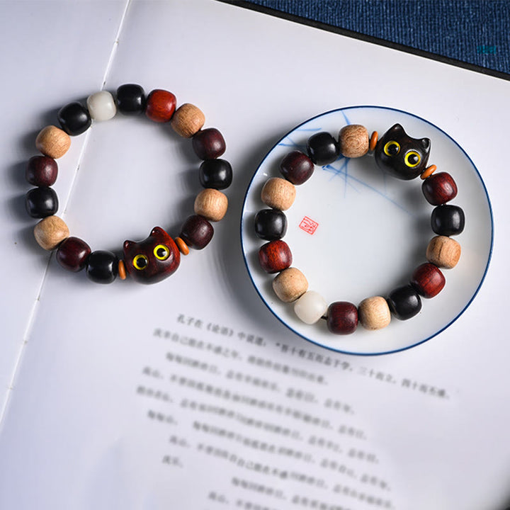 Pulsera de protección con grabado de gato lindo de madera de ébano de sándalo rojo de hoja pequeña con Buddha Stones - image 22
