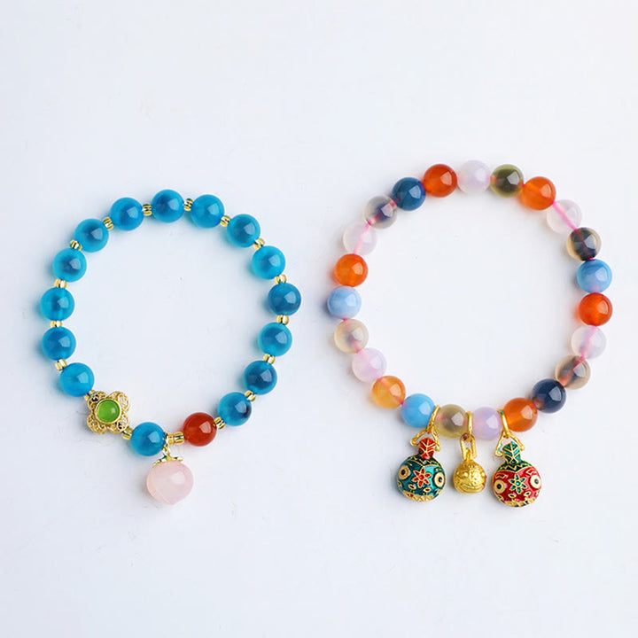 Pulsera con dijes de armonía de melocotón, familia de bestias tragadoras de oro, ágata de caramelo colorida, Buddha Stones