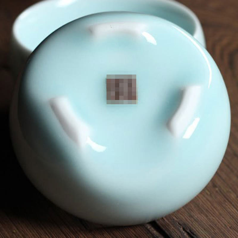 Taza de té de cerámica con forma de pez koi de colores y Buddha Stones