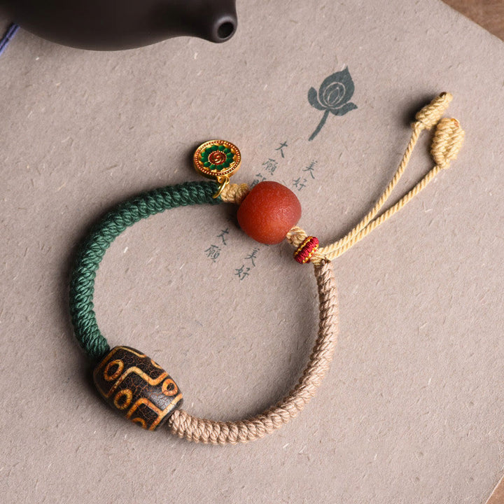 Pulsera de cuerda de riqueza con cuentas Dzi tibetanas de nueve ojos hechas a mano con Buddha Stones