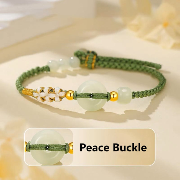 Pulsera trenzada de flor de melocotón de la suerte con hebilla de la paz de jade hetiano de Buddha Stones