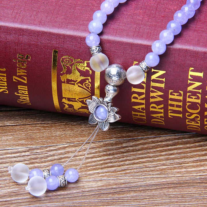 Pulsera de fuerza con cuentas de jaspe morado y Buddha Stones Mala
