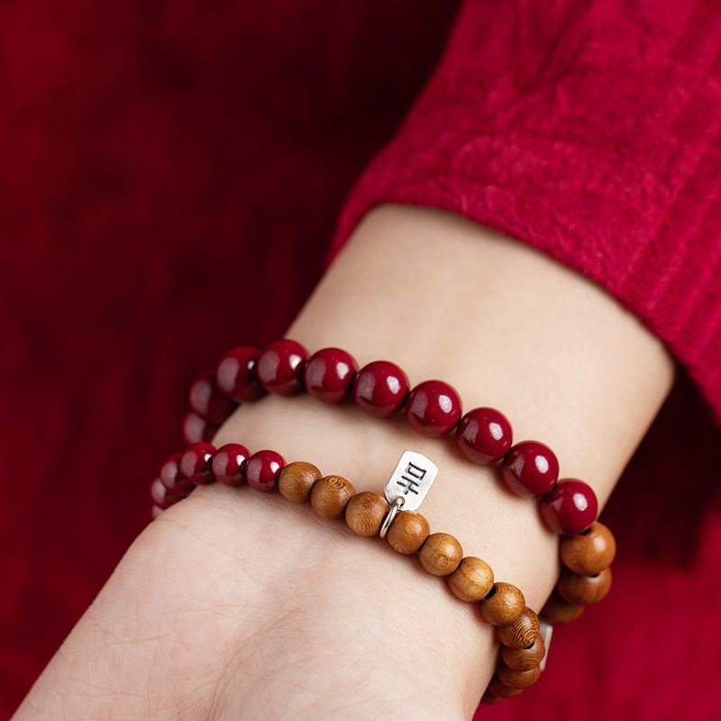 Pulsera de cinabrio de madera de melocotón de plata de ley 925 con Buddha Stones para protegerse de los malos espíritus