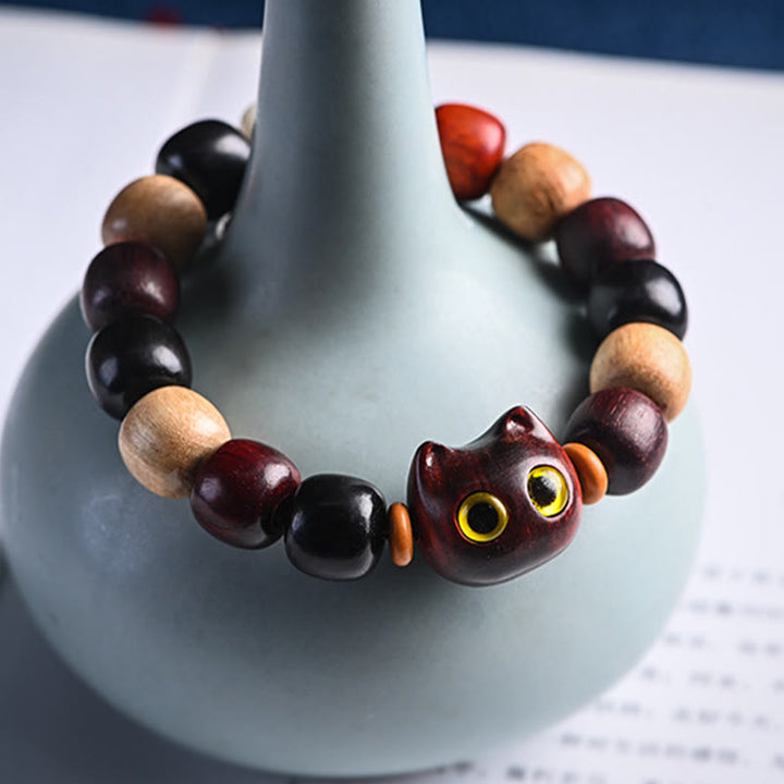 Pulsera de protección con grabado de gato lindo de madera de ébano de sándalo rojo de hoja pequeña con Buddha Stones - image 13