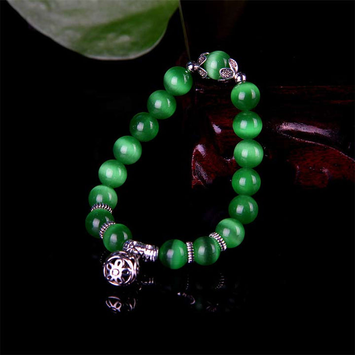 Pulsera de la suerte con ojo de gato tibetano y Buddha Stones