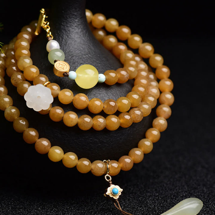 Pulsera de éxito de perlas de jade blanco de loto ámbar de topacio hetiano natural