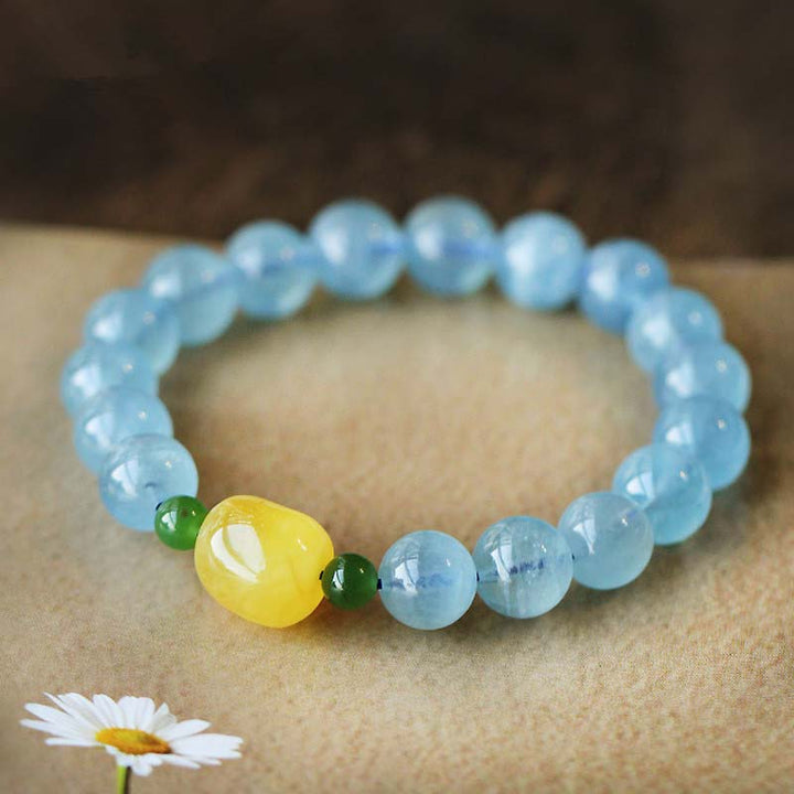 Pulsera curativa de serenidad con cuentas de ámbar y aguamarina natural