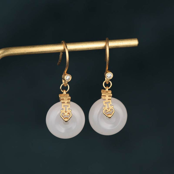 Pendientes de la fortuna de la doble felicidad del jade blanco de las Buddha Stones