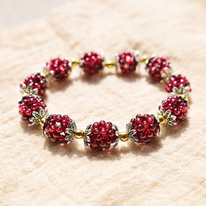 Pulsera curativa de granate natural con Buddha Stones
