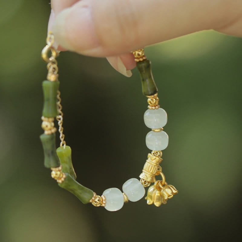 Pulsera de riqueza con Buddha Stones, bambú verde, jade, lirio de los valles
