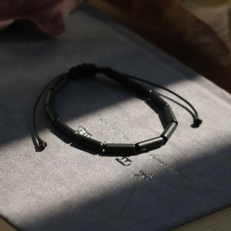 Pulsera de protección de soporte de cuentas de ónix negro con Buddha Stones