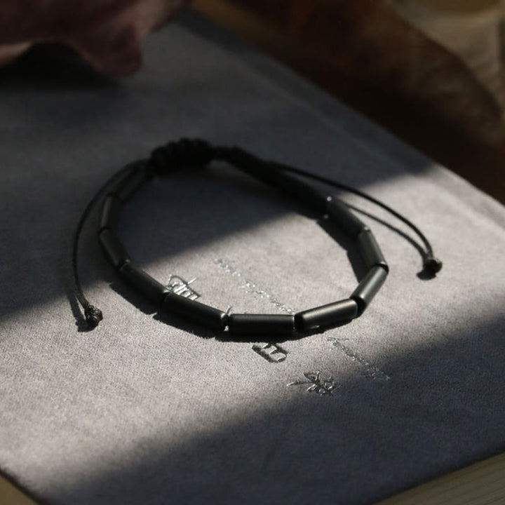 Pulsera de protección de soporte de cuentas de ónix negro con Buddha Stones