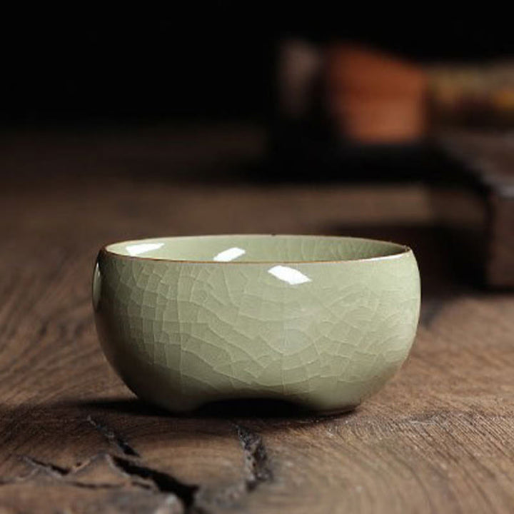 Taza de té de cerámica con forma de pez koi de colores y Buddha Stones