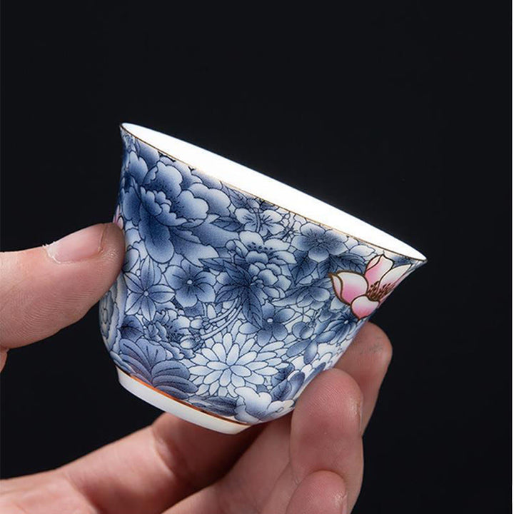 Taza de té de cerámica de porcelana azul y blanca, Buddha Stones, flores coloridas, orquídeas, olas del mar, taza de té de Kung Fu
