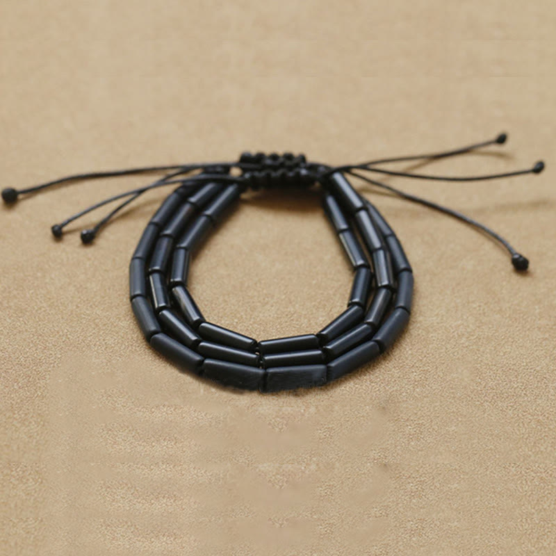 Pulsera de protección de soporte de cuentas de ónix negro con Buddha Stones