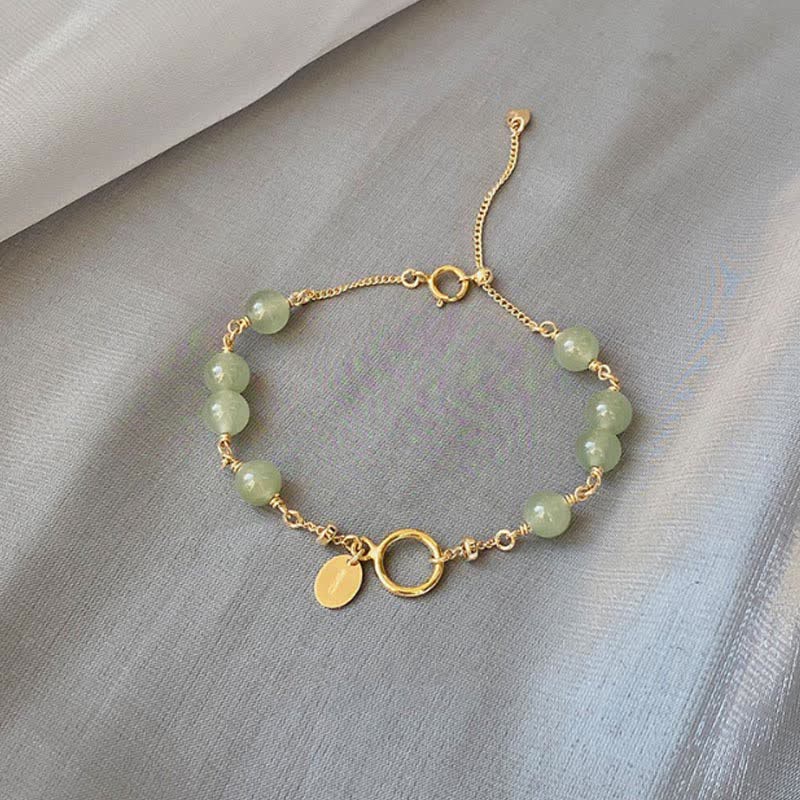 Pulsera con cuentas de suerte llena de oro de 14 quilates con jade hetiano natural único de Buddha Stones - Jade natural, el color puede variar ligeramente. - image 0