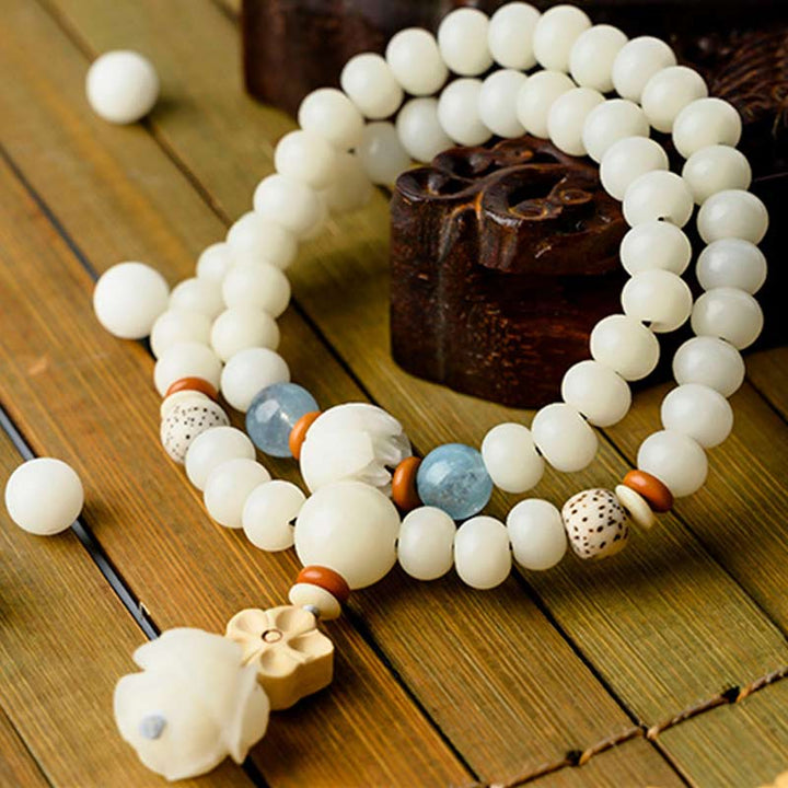 Pulsera de bendición de loto Bodhi de jade blanco tibetano con Buddha Stones