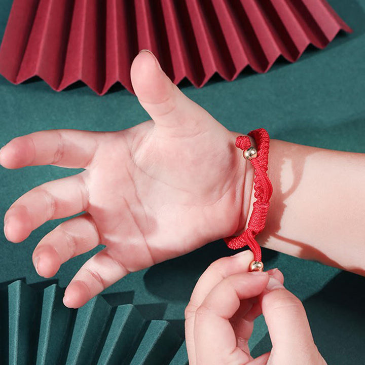Pulsera para niños hecha a mano con Buddha Stones de plata de ley 999, color rojo manzana, cuerda multicolor, protección de la suerte