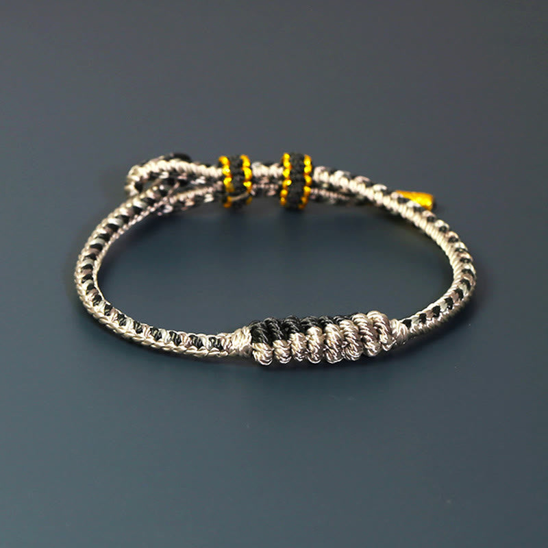 Pulsera de protección trenzada con rueda de oración, nudo de la paz, hecho a mano, con Buddha Stones tibetanas