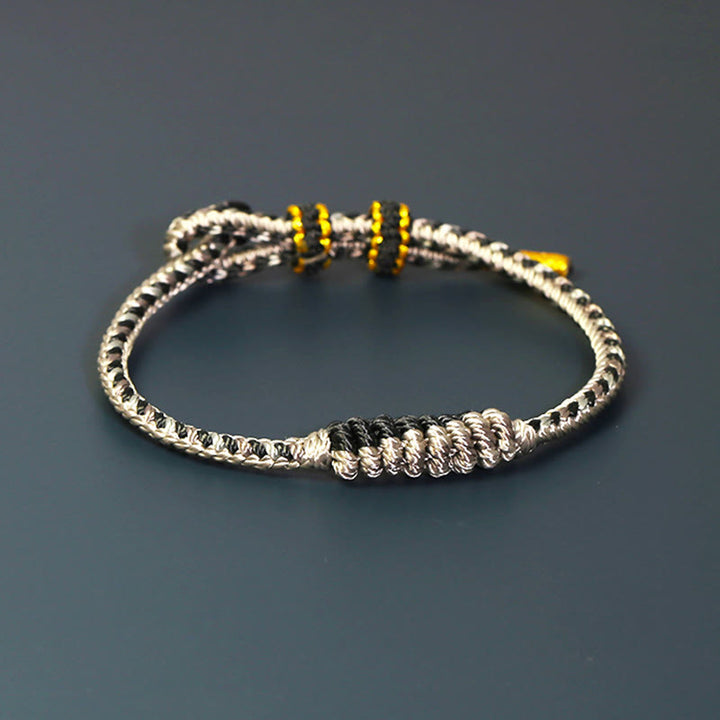 Pulsera de protección trenzada con rueda de oración, nudo de la paz, hecho a mano, con Buddha Stones tibetanas