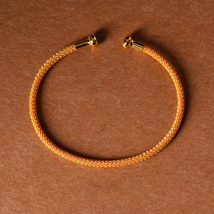 Pulsera de cuerda trenzada de la suerte hecha a mano con diseño simple de Buddha Stones - Naranja - image 22