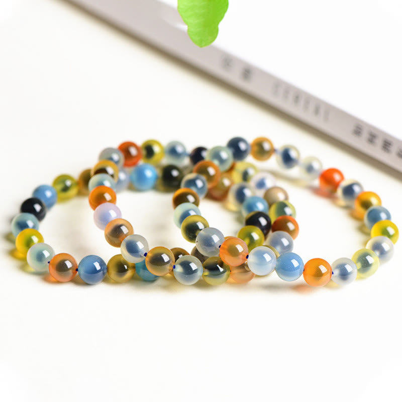 Pulsera de cuentas de fuerza de armonía de ágata de caramelo colorida natural de Buddha Stones