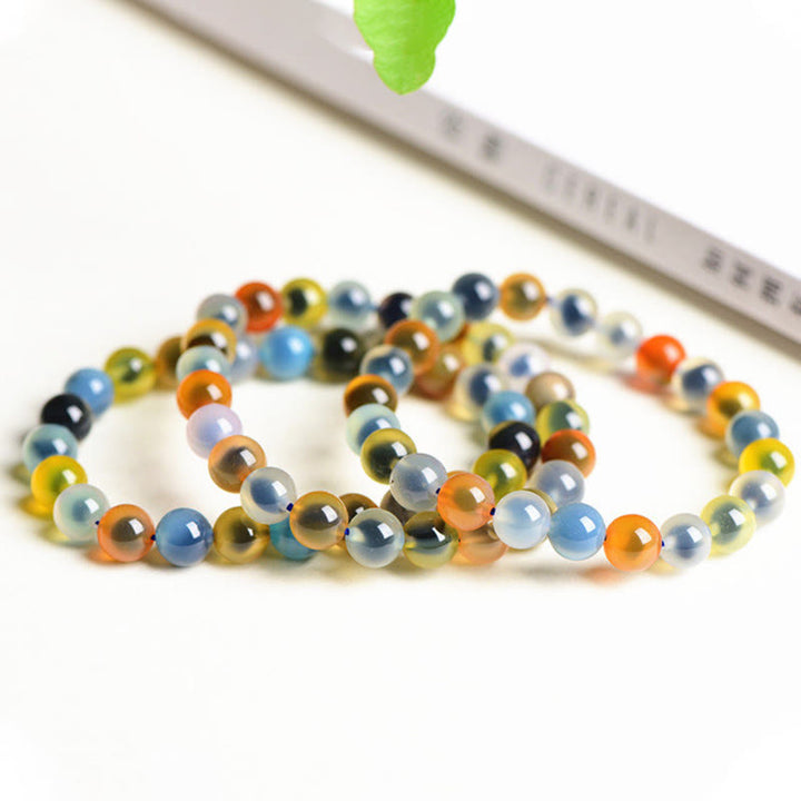 Pulsera de cuentas de fuerza de armonía de ágata de caramelo colorida natural de Buddha Stones