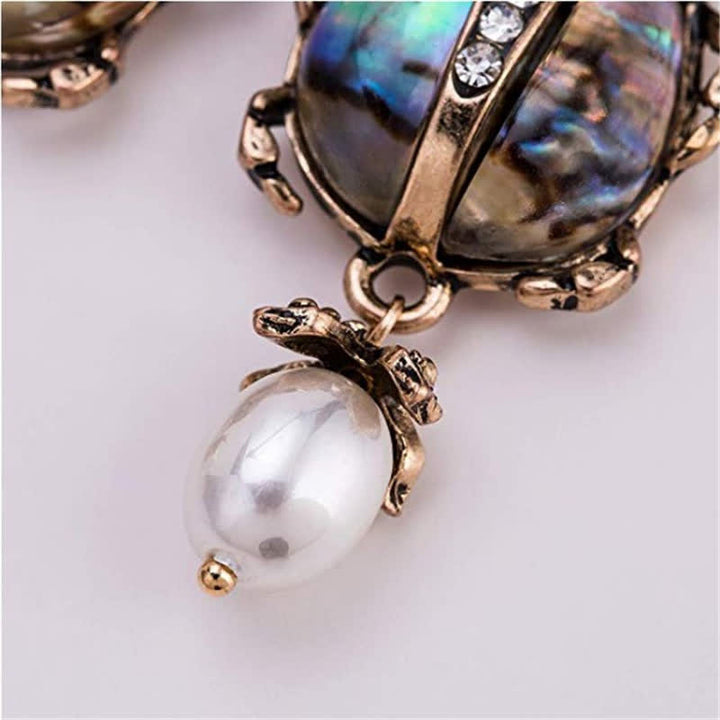 Pendientes colgantes con forma de calavera y escarabajo, estilo vintage, con perlas de cristal y escarabajo