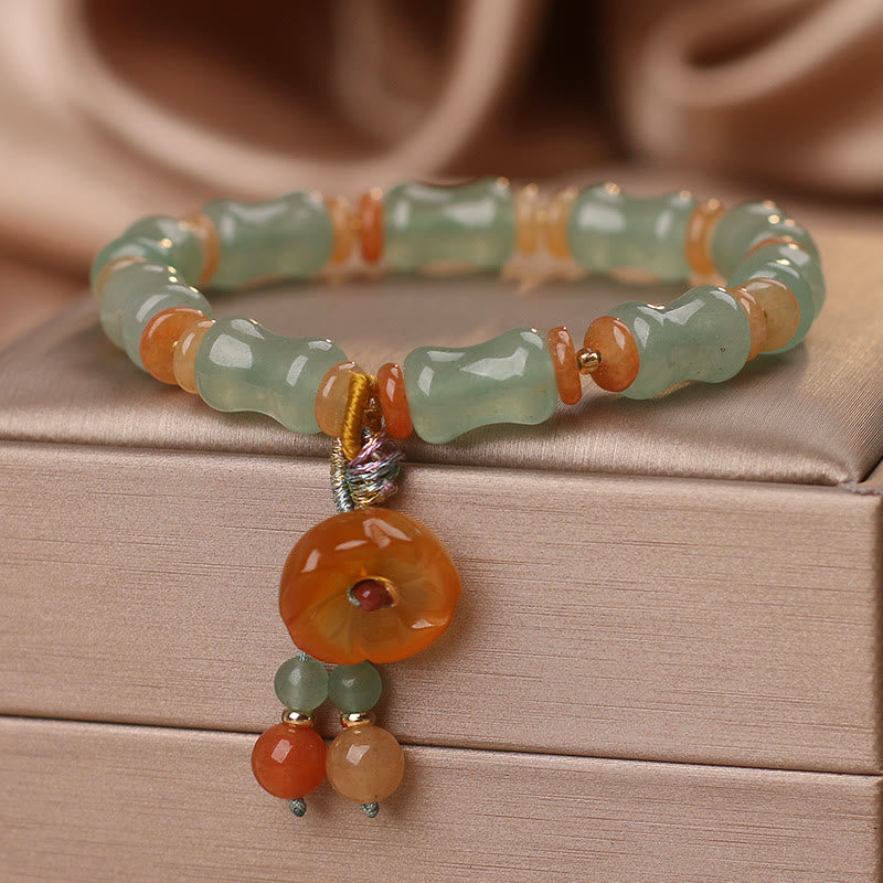 Pulsera de la suerte con patrón de flores de bambú y jade natural de Buddha Stones