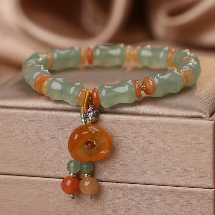 Pulsera de la suerte con patrón de flores de bambú y jade natural de Buddha Stones