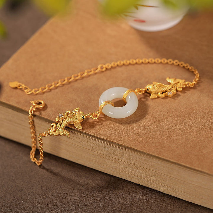 Pulsera de prosperidad de pez koi de jade blanco con Buddha Stones