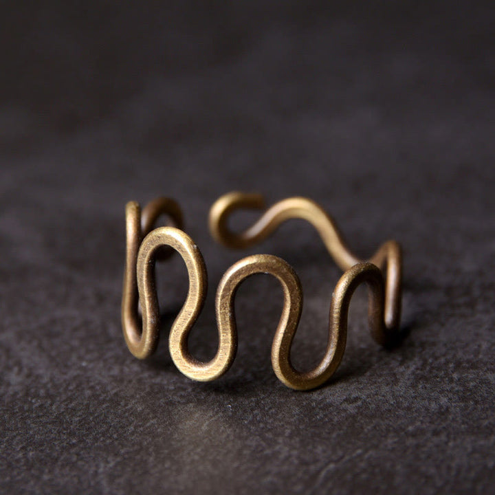 Anillo ajustable de cobre con diseño de latón curvado simple con Buddha Stones