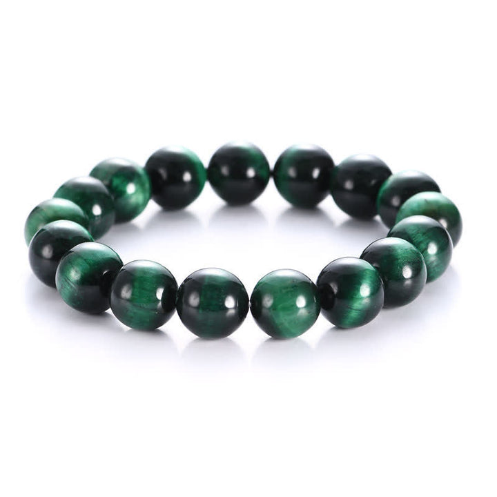 Pulsera de fuerza de ojo de tigre verde natural con Buddha Stones