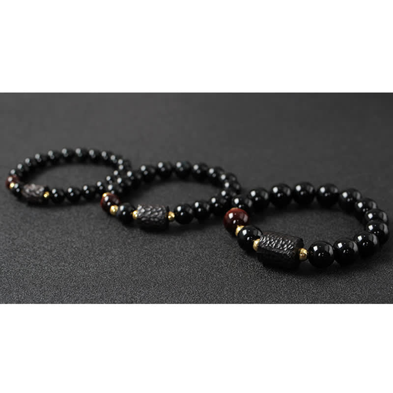 Pulsera de pareja de fuerza de ojo de tigre rojo de madera de ébano de obsidiana negra