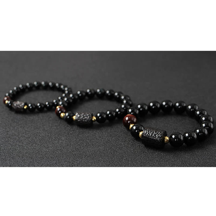 Pulsera de pareja de fuerza de ojo de tigre rojo de madera de ébano de obsidiana negra