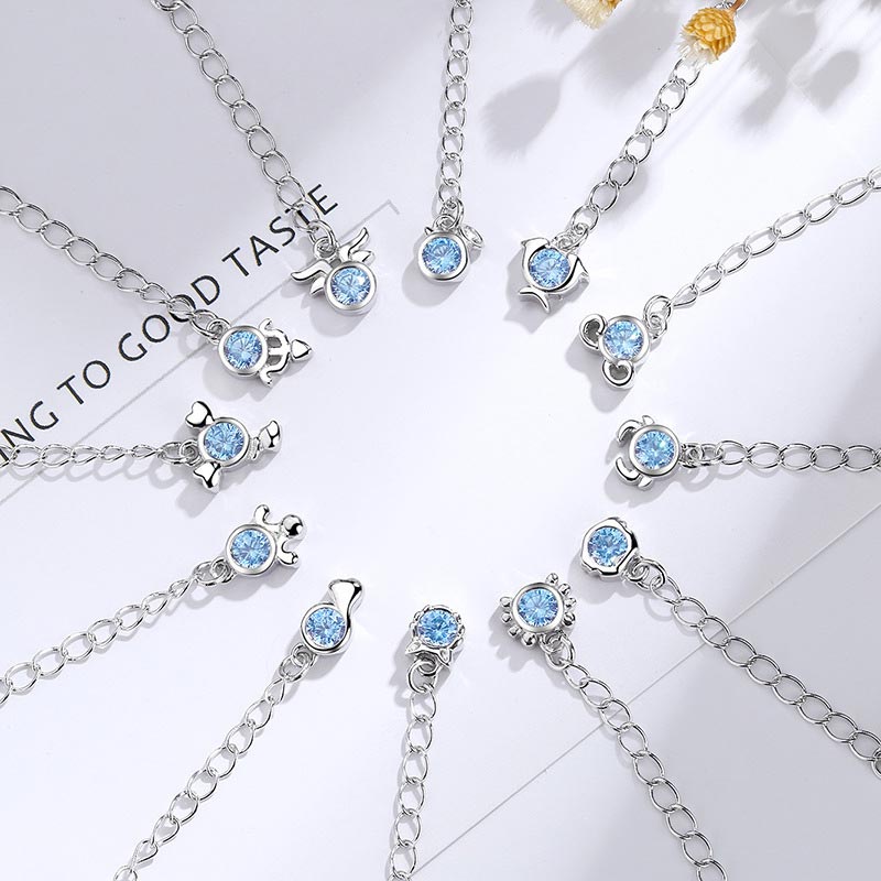 Pulsera con dijes de las 12 constelaciones del zodíaco de cobre bañado en plata 925 con Buddha Stones