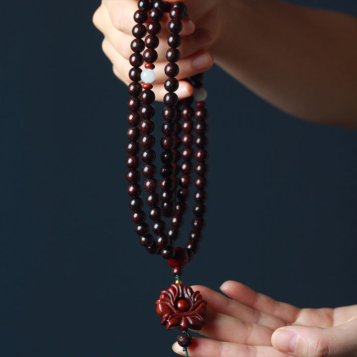 Pulsera de equilibrio Mala de loto de sándalo rojo de hoja pequeña tibetana con Buddha Stones
