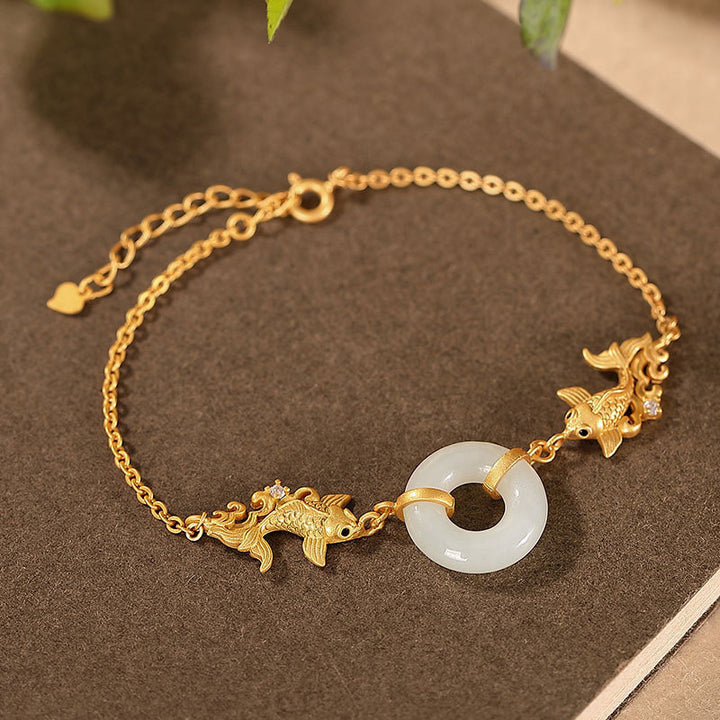 Pulsera de prosperidad de pez koi de jade blanco con Buddha Stones