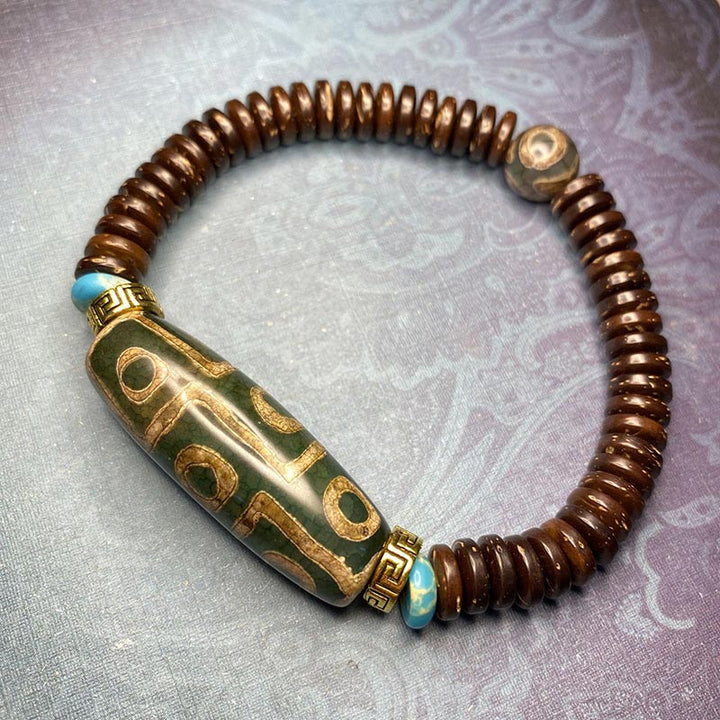 Pulsera de riqueza de cuentas Dzi tibetanas de nueve ojos con Buddha Stones