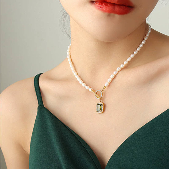 Colgante de collar con dije de riqueza de circonitas y perlas