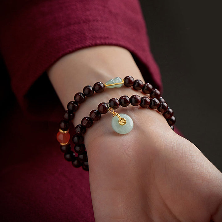 Buddha Stones Zodíaco Chino Buda Natal Hoja Pequeña Sándalo Rojo Jade Ágata Roja PiXiu Sooth Pulsera