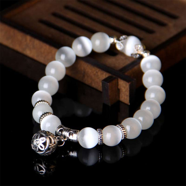 Pulsera de la suerte con ojo de gato tibetano y Buddha Stones