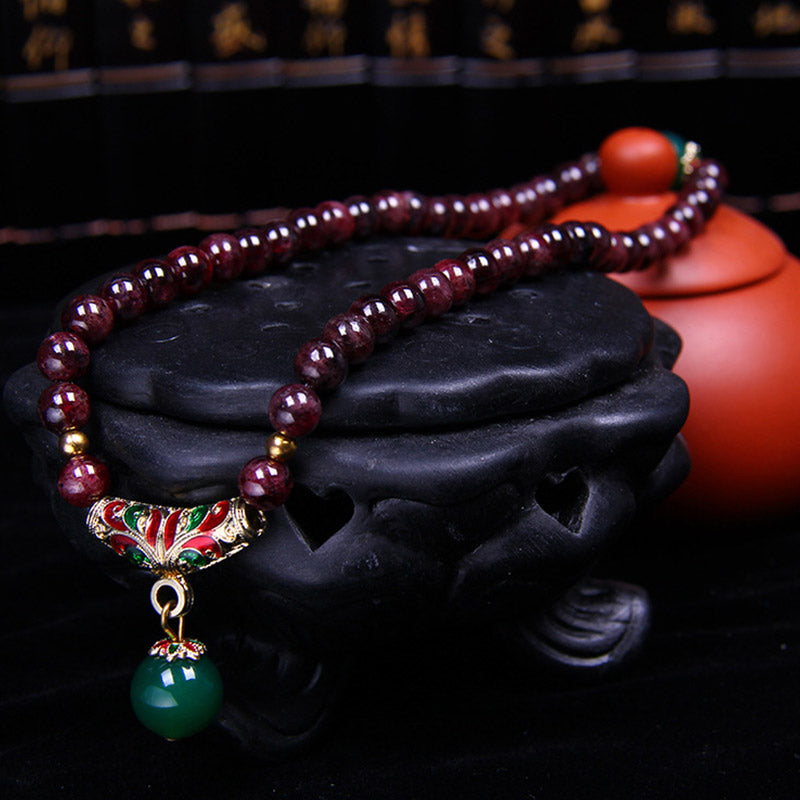 Pulsera de bendición de granate natural con Buddha Stones