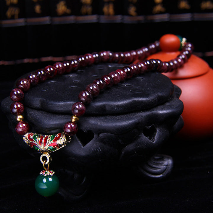 Pulsera de bendición de granate natural con Buddha Stones