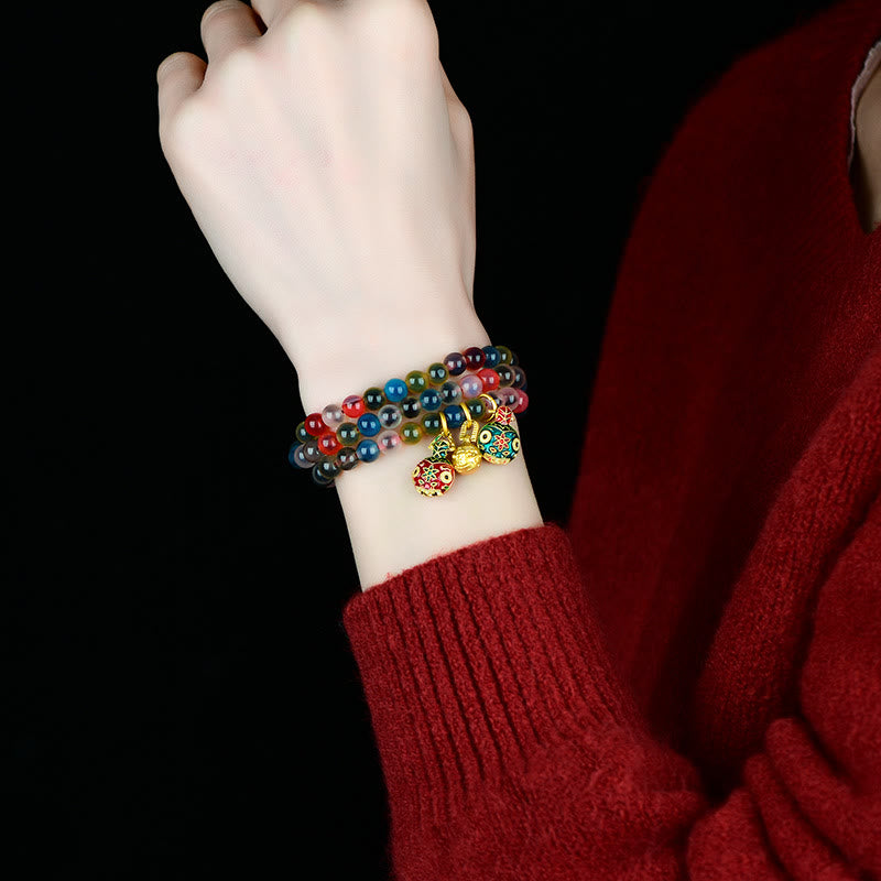 Pulsera de triple envoltura con dije de fuerza familiar de bestia tragadora de oro con ágata de caramelo colorida y Buddha Stones