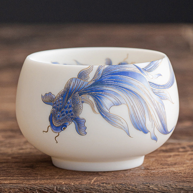 Taza de té de cerámica de porcelana blanca, pez Koi, Buddha Stones, taza de té de Kung Fu