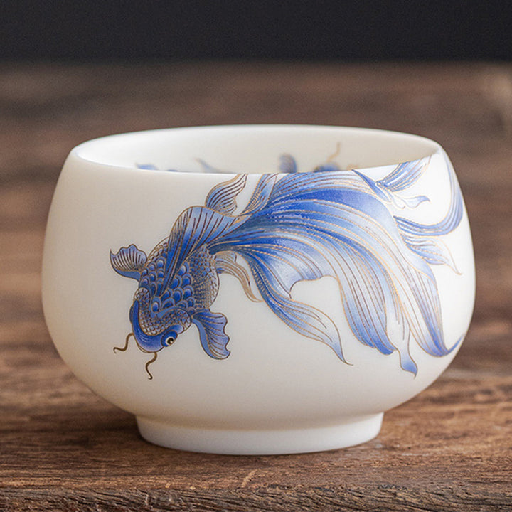 Taza de té de cerámica de porcelana blanca, pez Koi, Buddha Stones, taza de té de Kung Fu