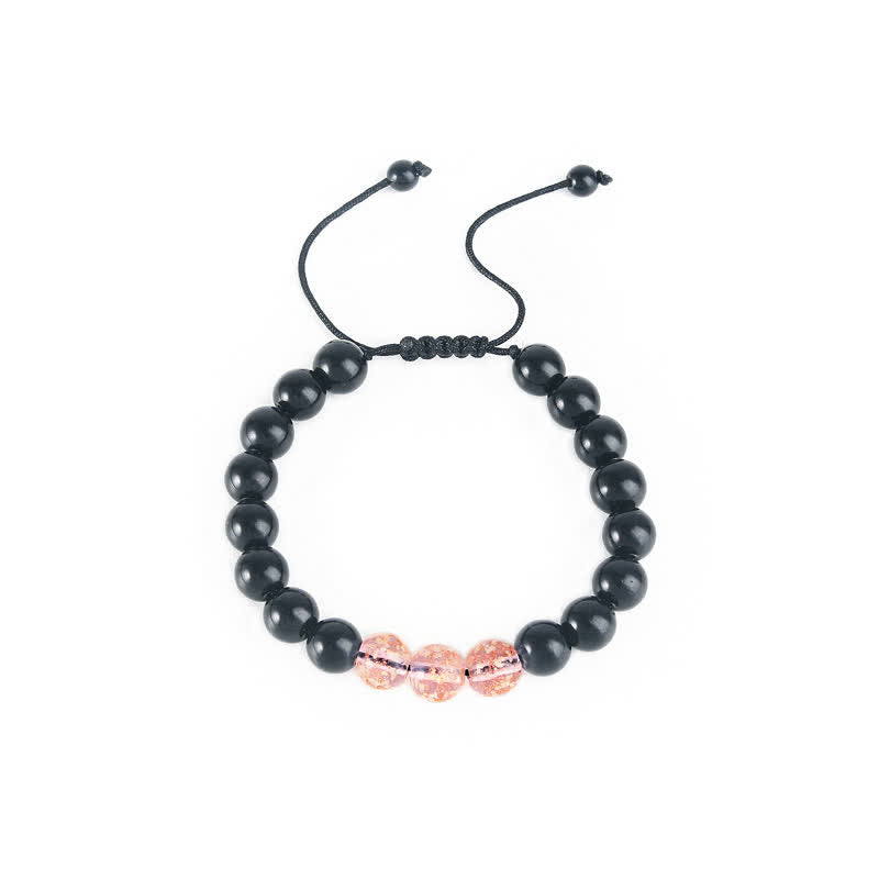 Pulsera de fuerza con piedra luminosa luminosa de obsidiana negra de Buddha Stones